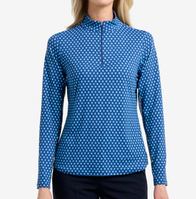 Blue diamond printed long-sleeve shirt worn by a person on a white background